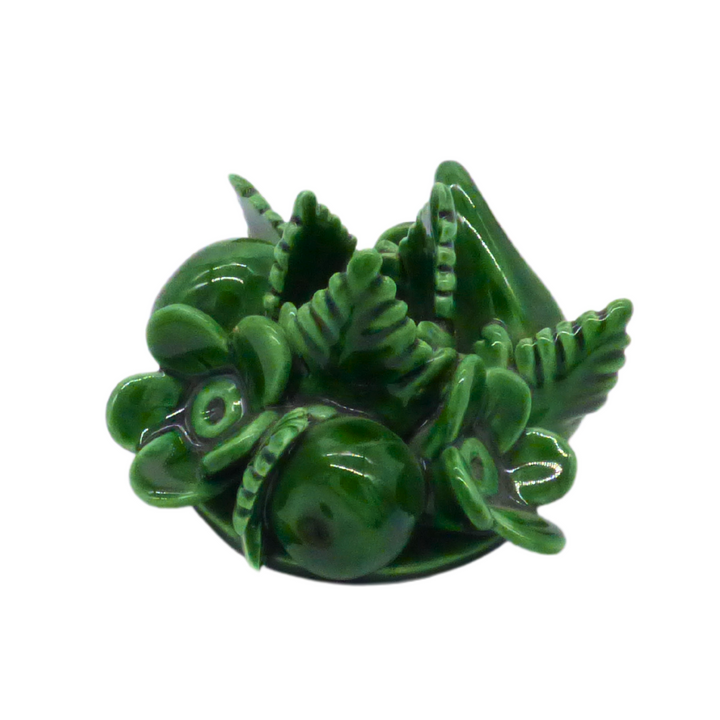 Fruit candle holder in green glaze side view