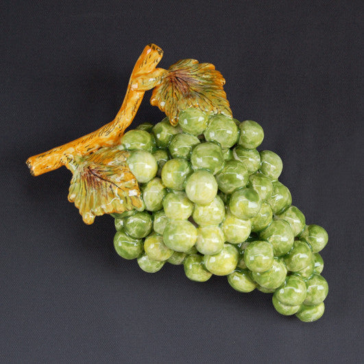 Bunch of earthenware green grapes