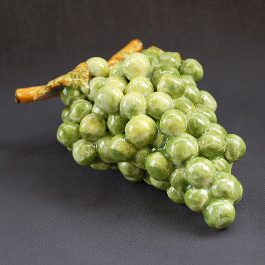 Bunch of earthenware green grapes