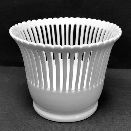 Openwork earthenware planter side view