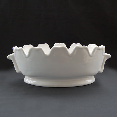 Oval toothed edge planter