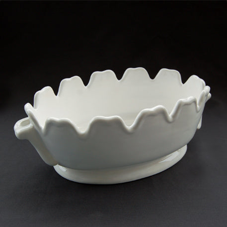 Oval toothed edge planter