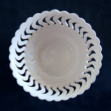 Ceramic planter with S shaped openwork top view