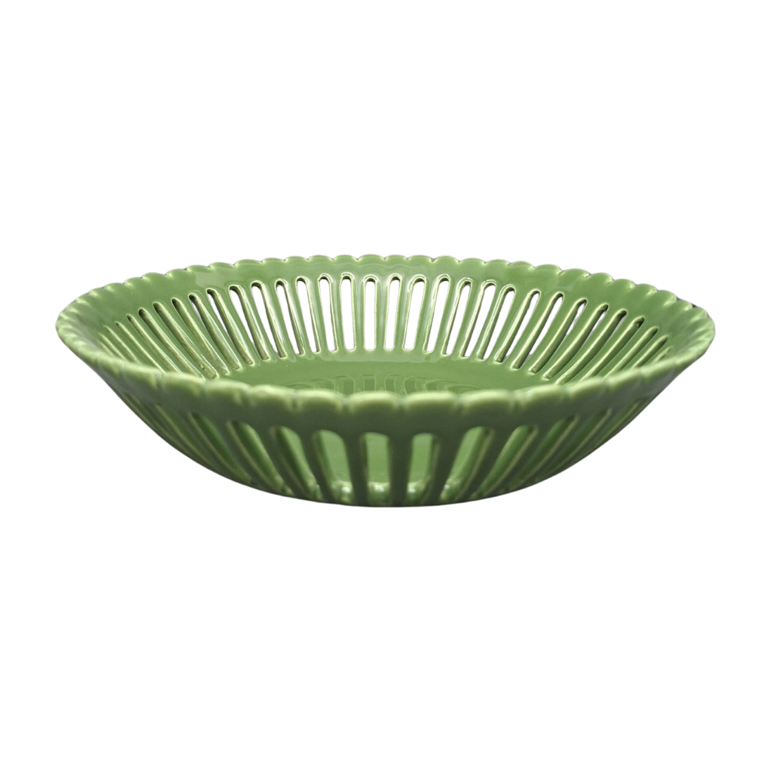 A leaf green ceramic basket with a fluted rim and vertical ribbed texture, shown on a plain white background.