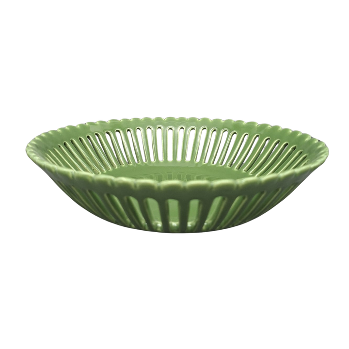 A leaf green ceramic basket with a fluted rim and vertical ribbed texture, shown on a plain white background.