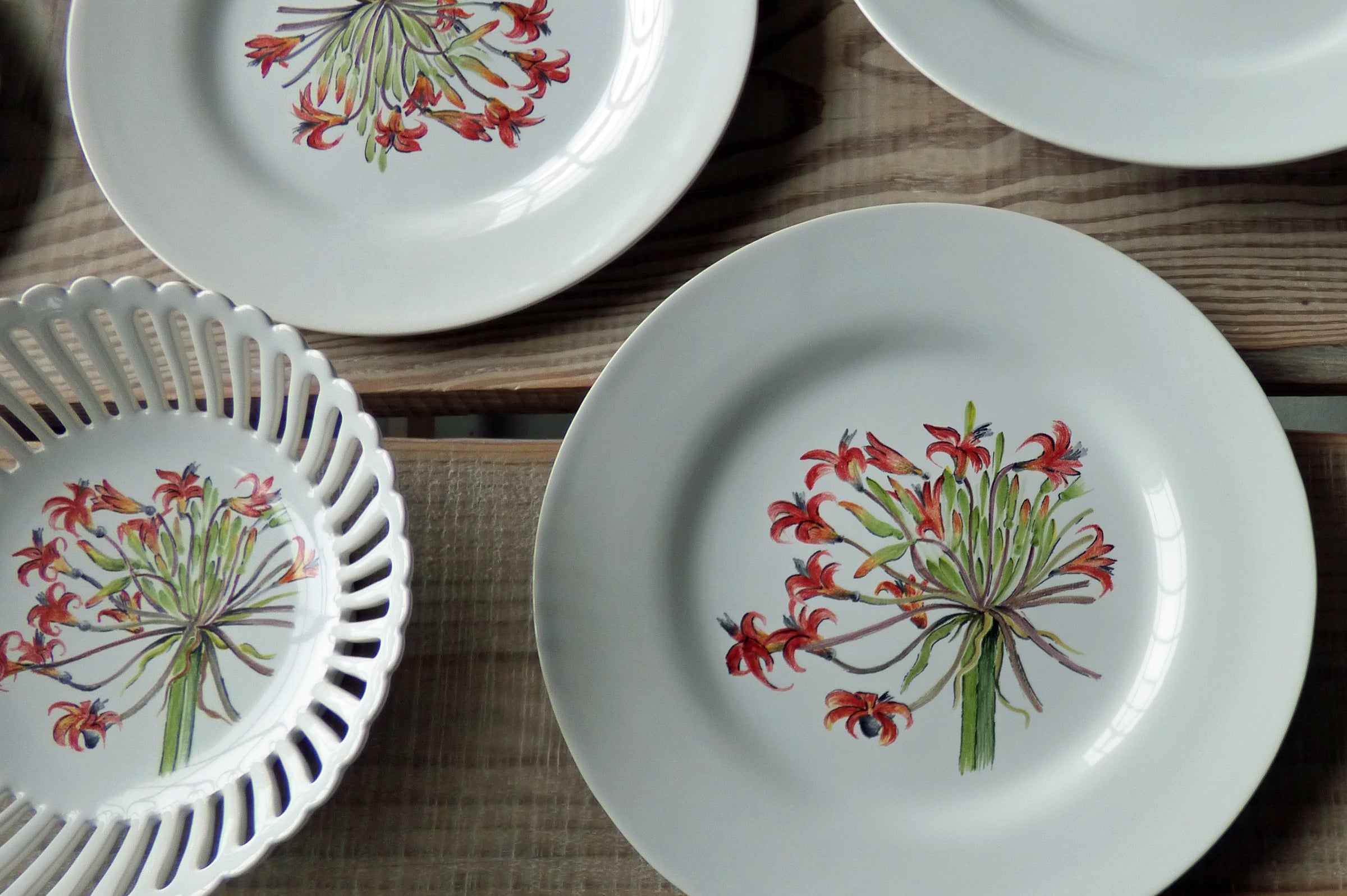 Hand painted plates and baskets by Bourg-Joly Malicorne