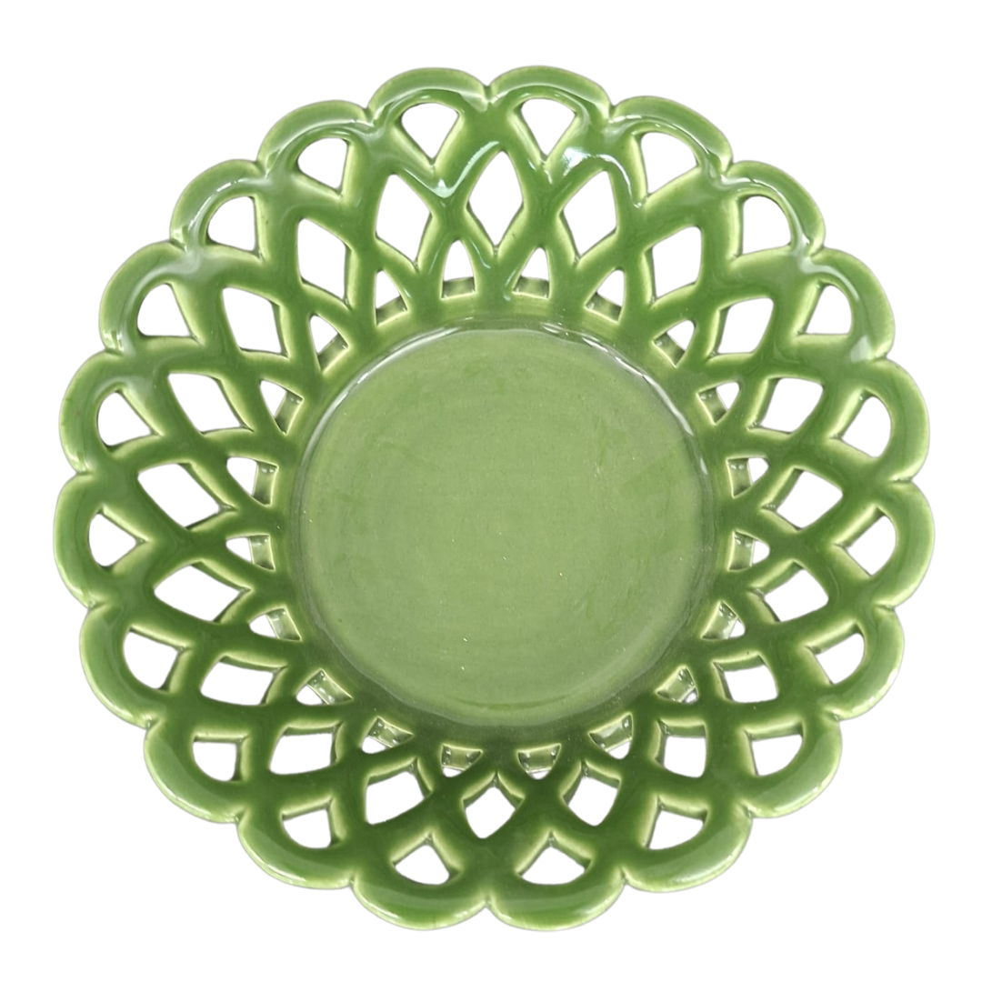 A leaf green Louis Philippe handmade ceramic basket with an intricate openwork, scalloped rim and a smooth, solid center, shown from a top-down perspective on a white background.