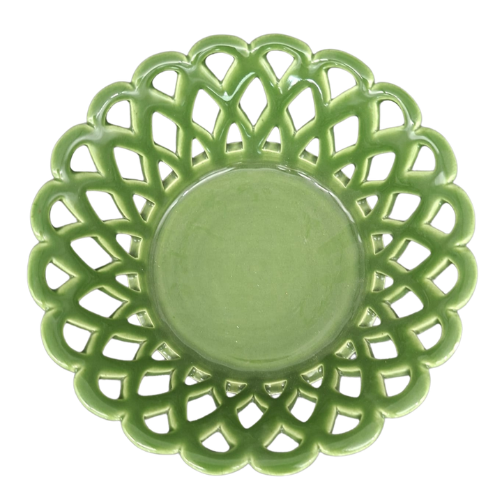 A leaf green Louis Philippe handmade ceramic basket with an intricate openwork, scalloped rim and a smooth, solid center, shown from a top-down perspective on a white background.