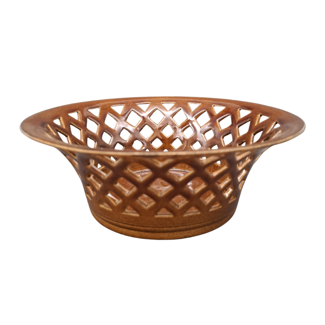 A brown ceramic bowl with a lattice cutout pattern, shown on a plain white background.