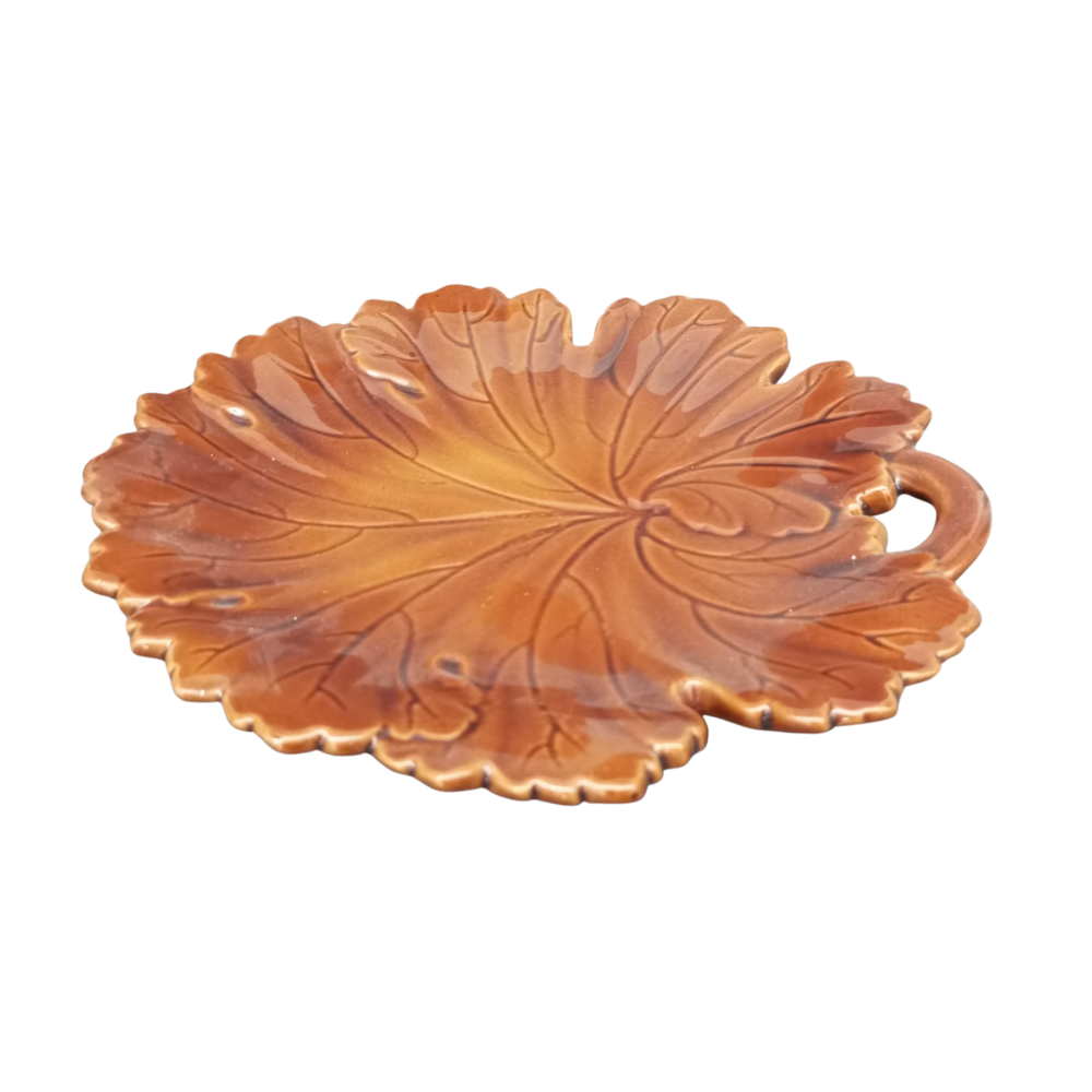 Vine leaf plate in brown side view