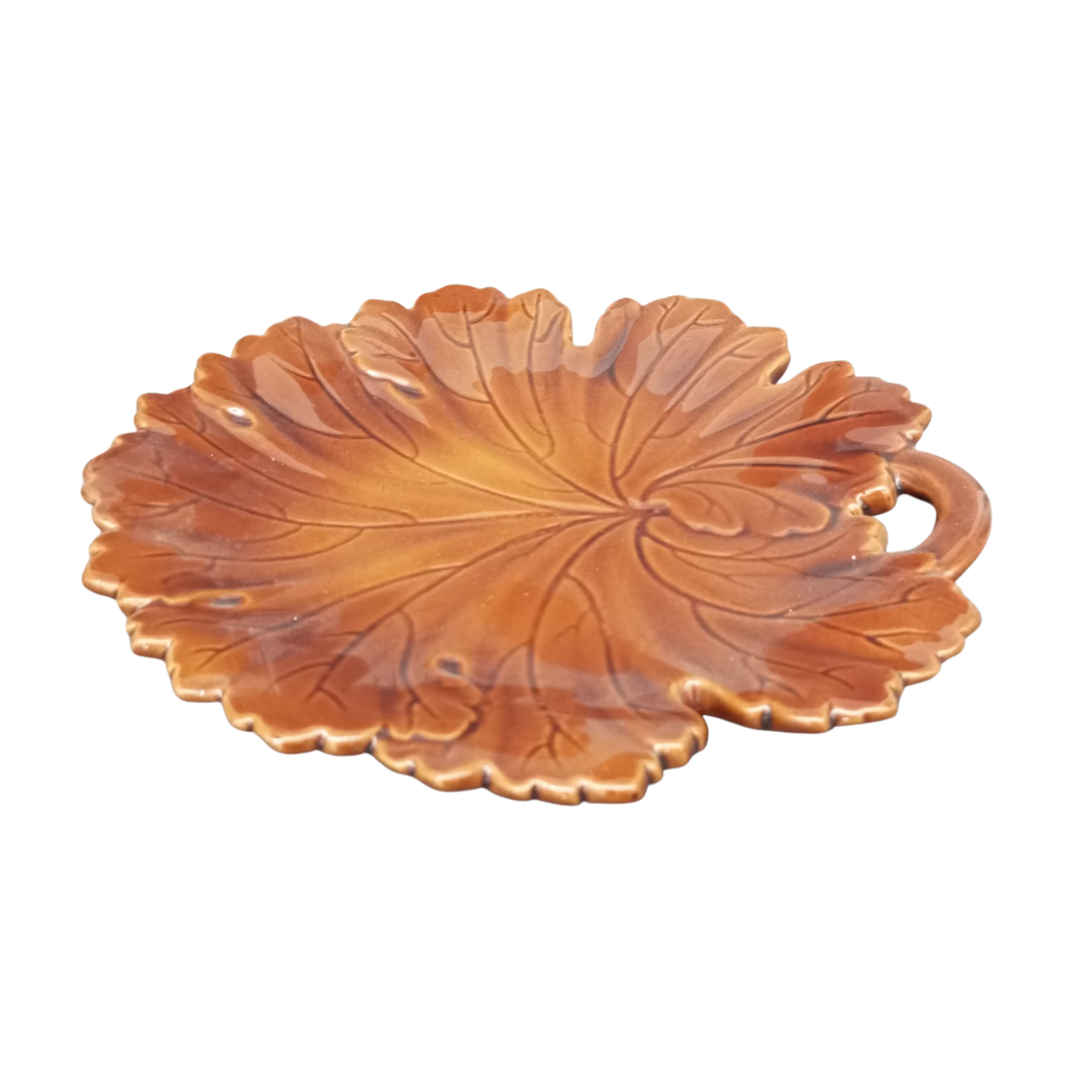 Vine leaf plate in brown side view
