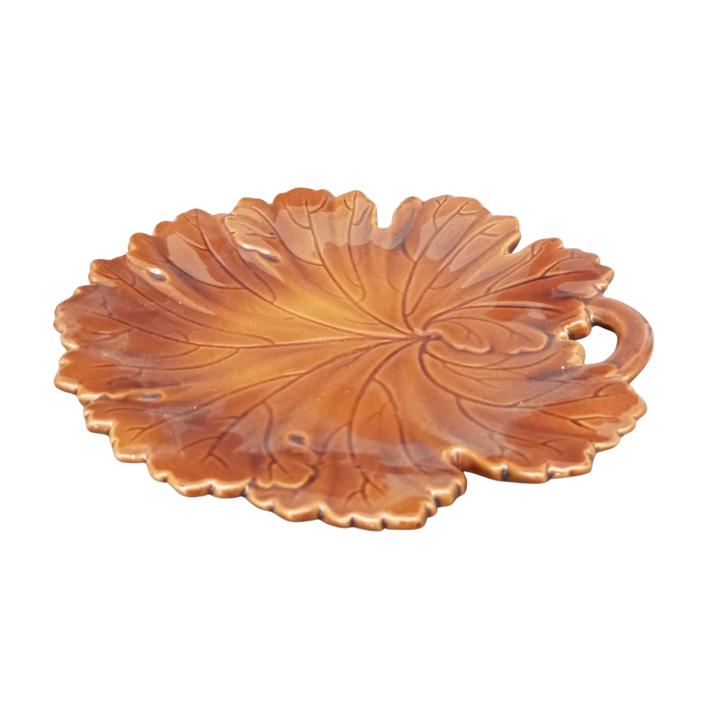 Vine leaf plate in brown side view