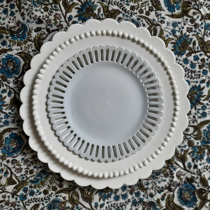 Chevet Pleine dinner plate, Perles salad plate and Bourg-Joly openwork plate by Bourg-Joly Malicorne