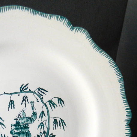 Scalloped Edge Feston plate with hand painted Chinoiserie 1 'The Merry Maker' monochrome Turquoise decoration