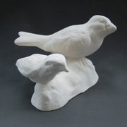 White earthenware small and large bird pair