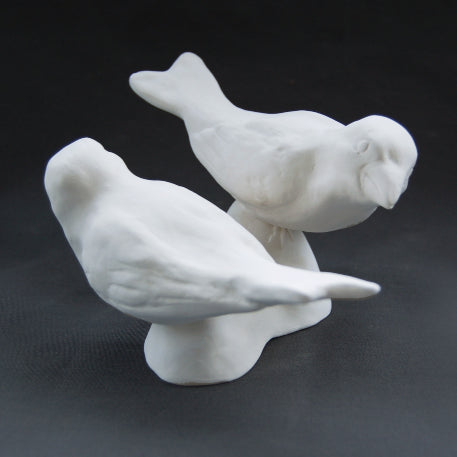 White earthenware large bird pair