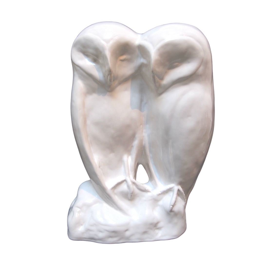 <tc>Couple de chouettes en faïence blanche</tc>