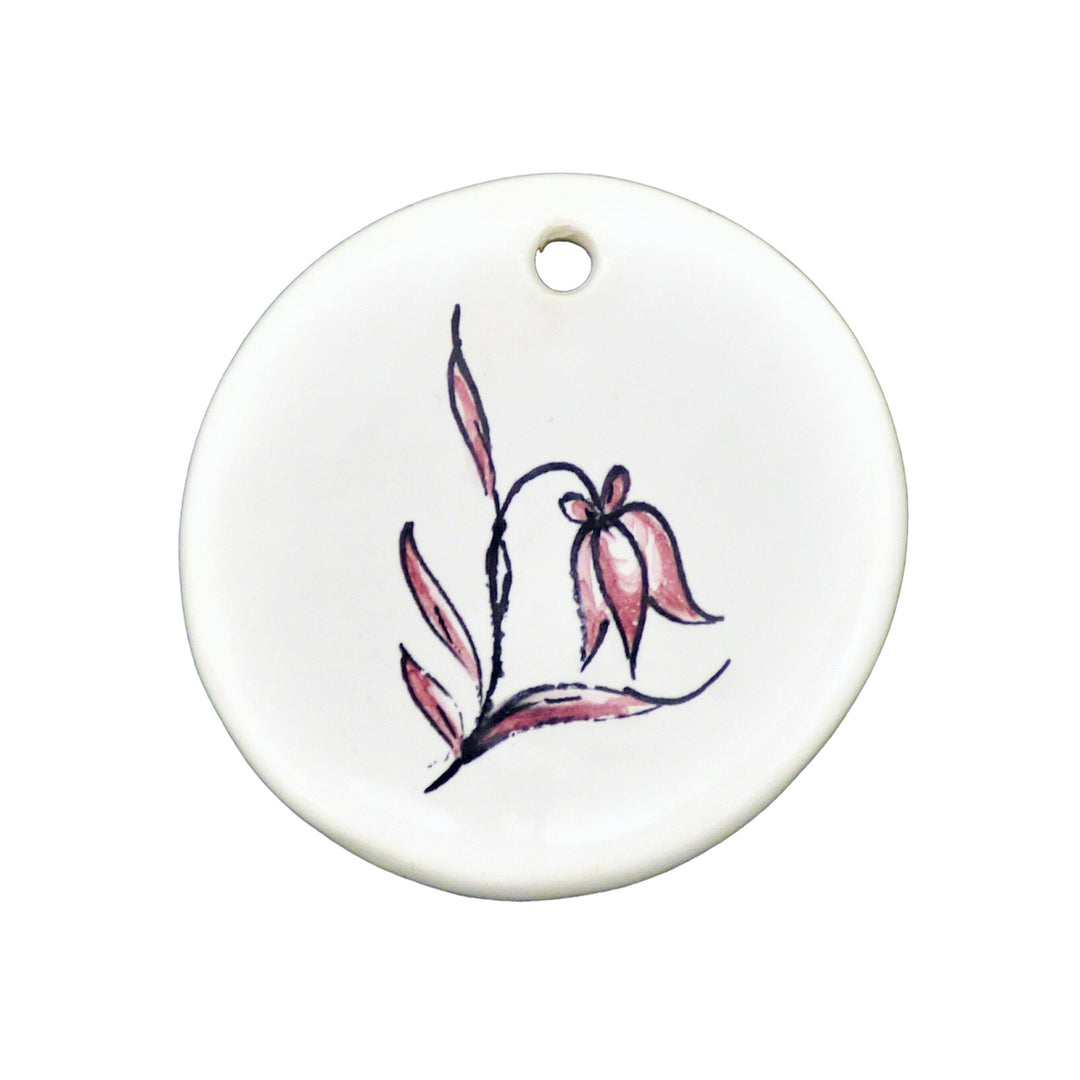 Disc ornament with a hand painted red flower